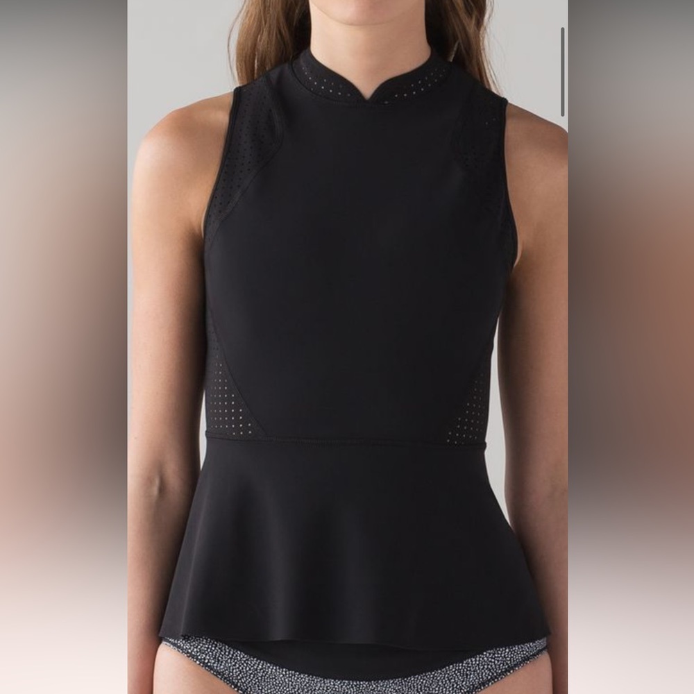 EUC Lululemon Paddle Times Peplum top in
Black size 4